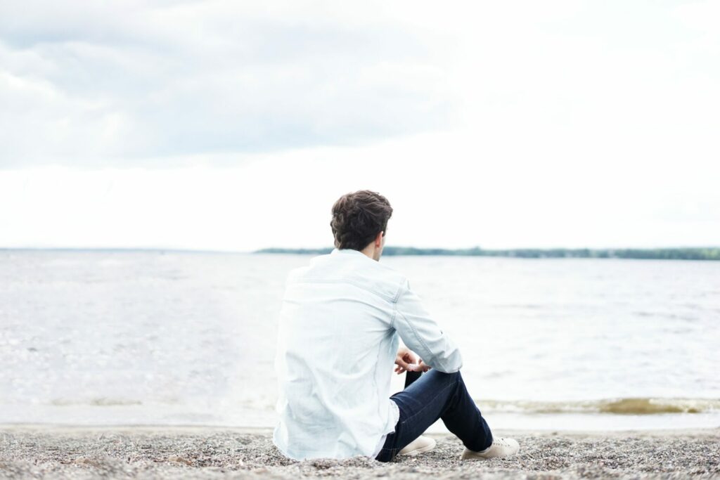 man sitting and thinking